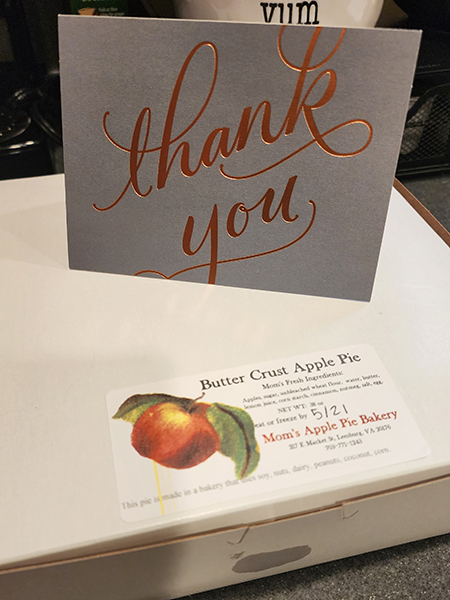 photo of a Thank You card and an apple pie box, reading "Butter Crust Apple Pie" from "Mom's Apple Pie Bakery"