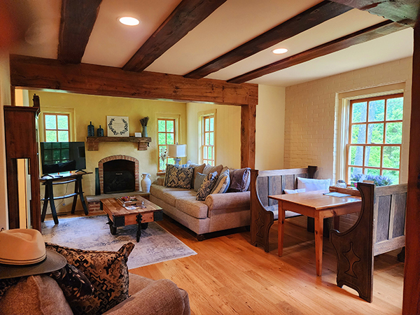 photo of the interior of the English Cottage in Purcellville, VA with exposed beams and a spacious living area