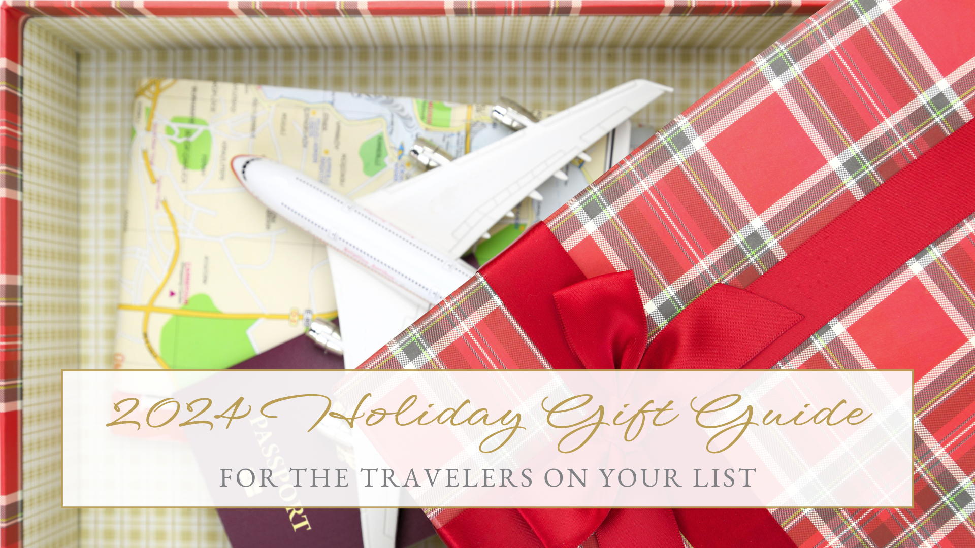 photo of a red plaid gift box, with a red bow, open to reveal a toy airplane, a map and a passport, with a text overlay that says "2024 Holiday Gift Guide for the travelers on your list"